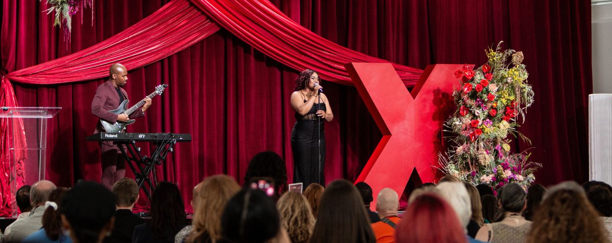 TEDxLasVegas singer on stage